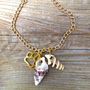 Paw charm bracelet with shells